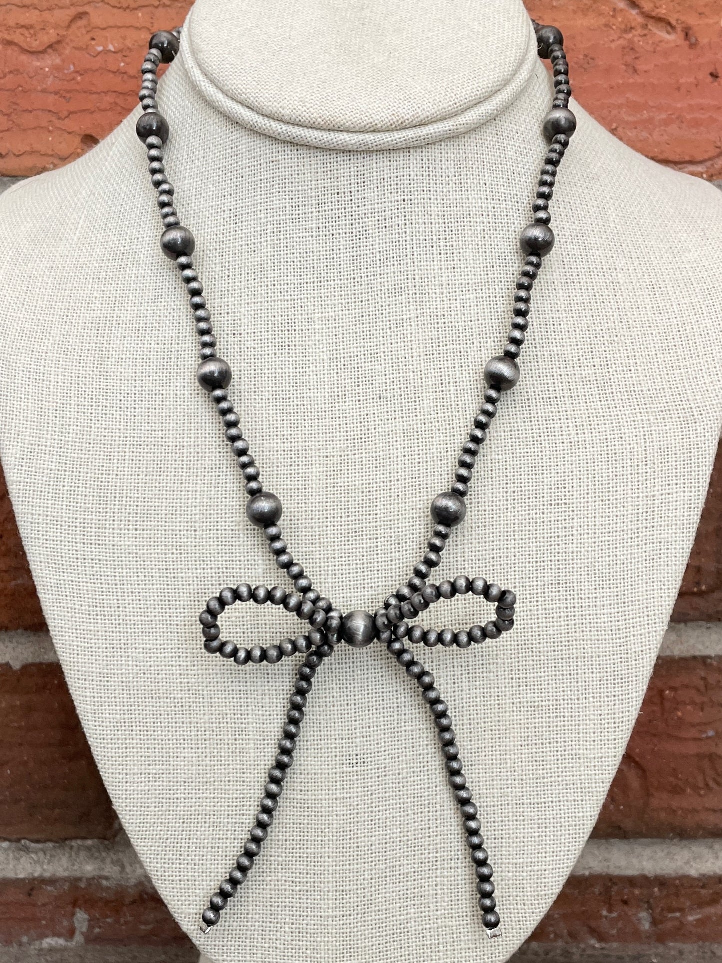 Navajo Style Pearl Beaded Bow Necklace