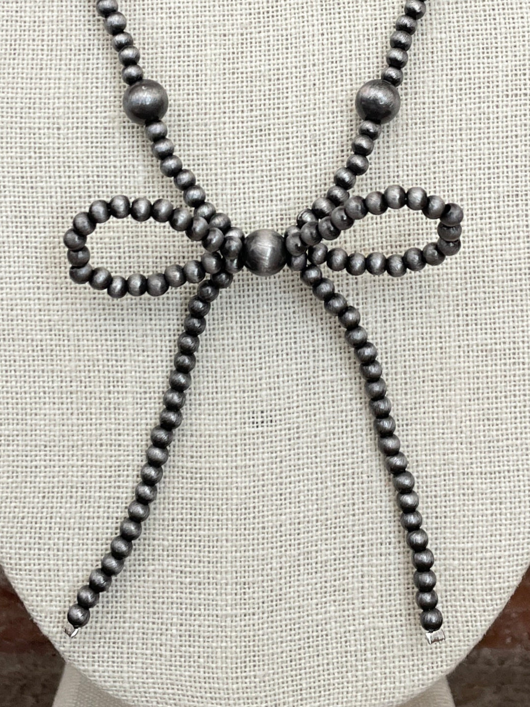 Navajo Style Pearl Beaded Bow Necklace