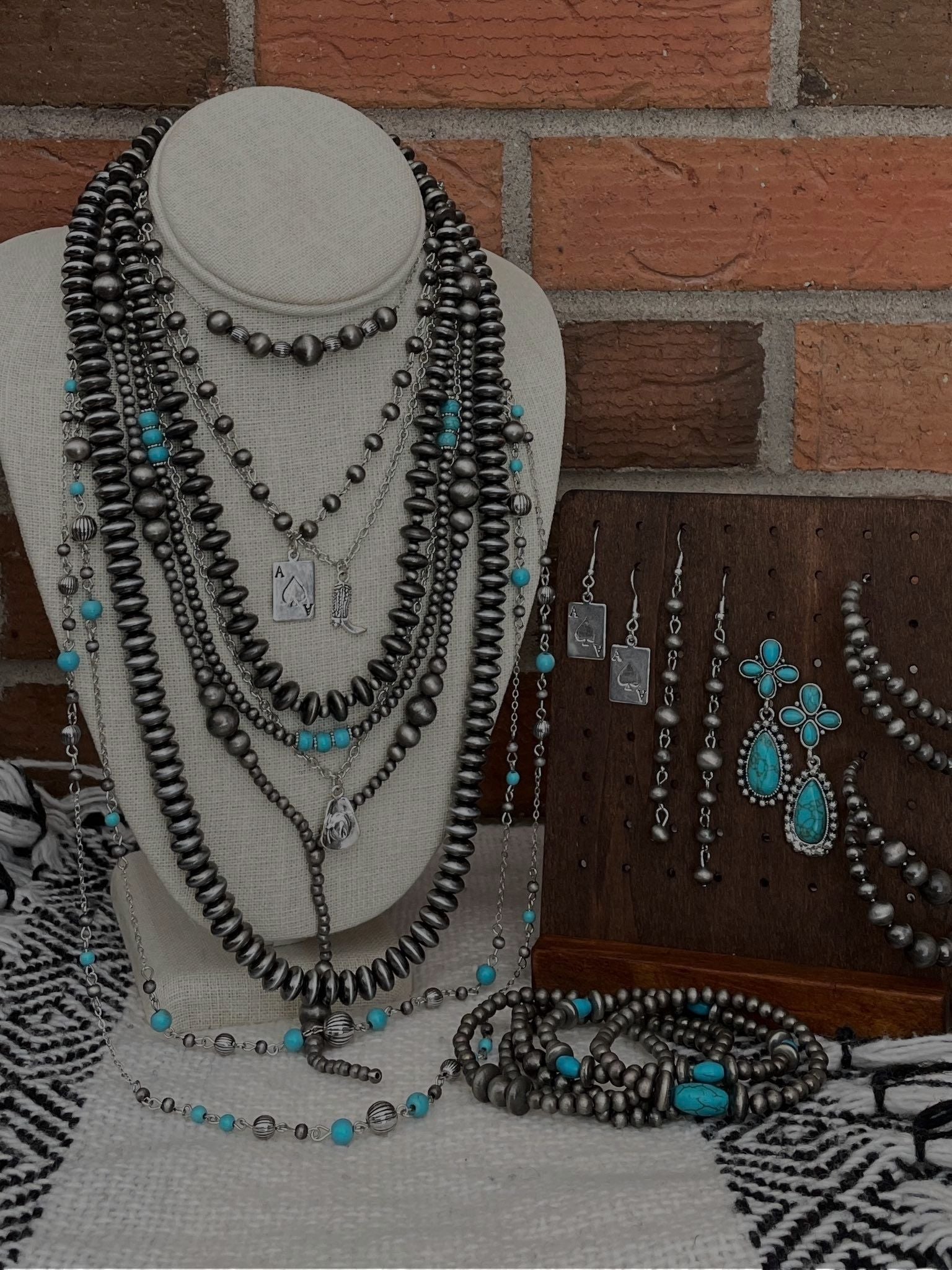 Western jewelry stack including Navajo style pearl necklaces and earrings from Red Saguaro Trading Post